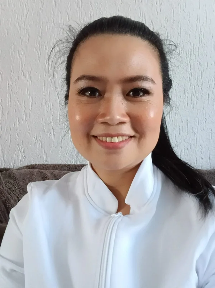 Washira in her white work uniform